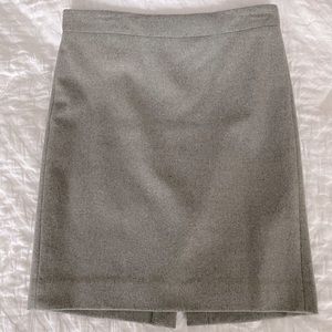 Women’s J. Crew pencil skirt in light heather grey, size 8. Back zip closure.